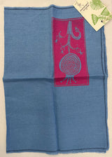 Tessuto azzurro con melograno verde e rosa