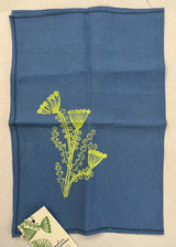 Tessuto azzurro con fiore verde