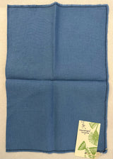 Tessuto azzurro con fiore verde