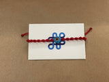 Red braided bracelet