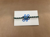 Green braided bracelet