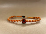 Orange braided bracelet